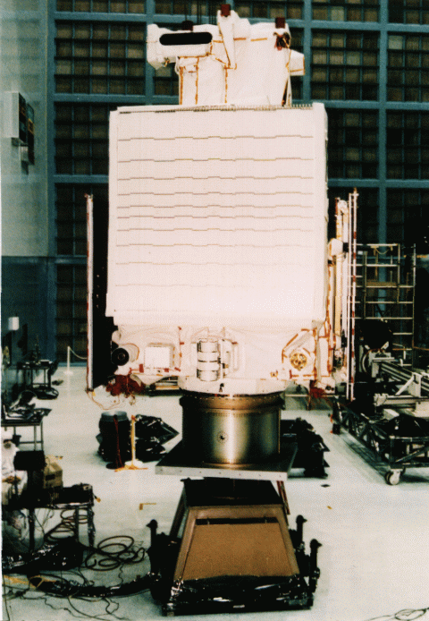 Earth-facing side of TRMM Spacecraft mostly taken up by the receiver for the Precipitation Radar (PR). The Lightning Imaging Sensor (LIS), CERES, and Earth Sensor (ES) are at the bottom of the photo; the Visible and Infrared Scanner (VIRS) at the top.